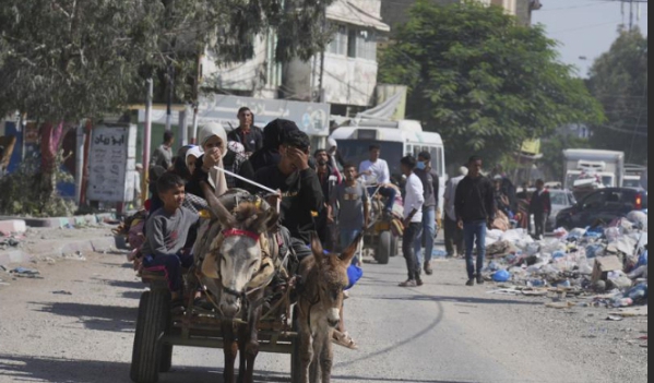 The exodus: Palestinians flee south in Gaza as Israel stages brief ground offensive